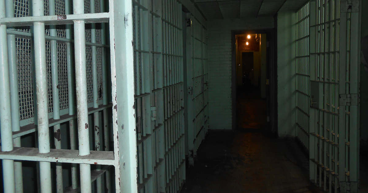 A dark hall in a prison